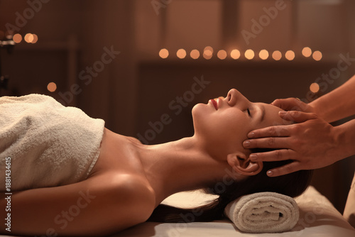 Young woman having facial m...