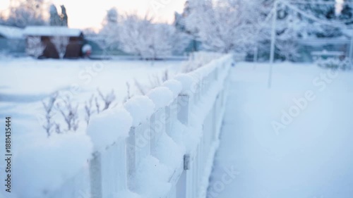 Wallpaper Mural Smooth camera movement along a white wooden fence in winter. Everything is covered in snow, frosty morning Torontodigital.ca