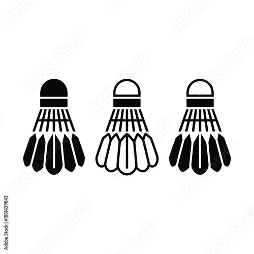 Three badminton shuttlecocks in different shades of black and white