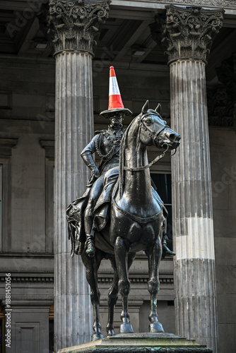 the Duke of Wellington Statue in Glasgow, famously topped with a traffic cone