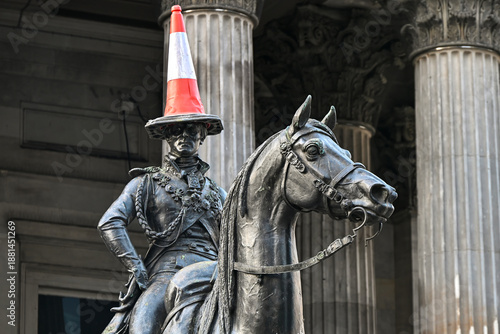 the Duke of Wellington Statue in Glasgow, famously topped with a traffic cone