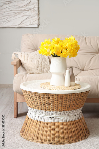 Coffee table with vase of n...