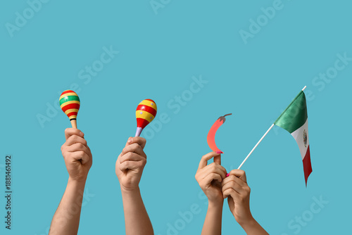 Hands with maracas, Mexican...