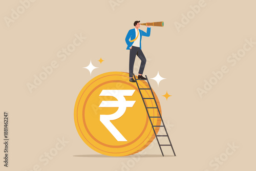 Businessman looks through telescope on large rupee coin to find new financial opportunities