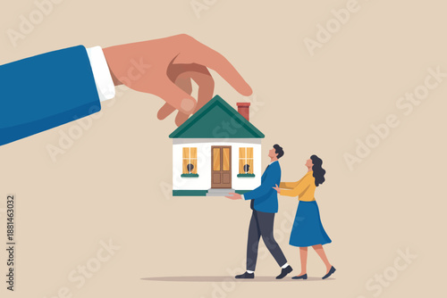Giant hand offers a house to a couple