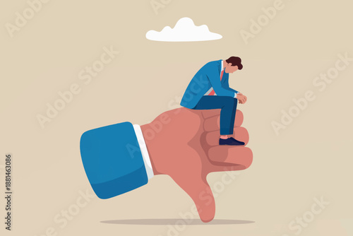 Man sitting on a thumb down gesture, symbolizing failure or dislike