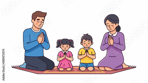 A family of four praying together on a mat