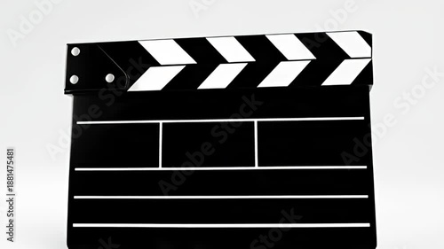 A black and white clapboard on a plain background is viewed from the front with clear visibility of its details and markings for film production purposes