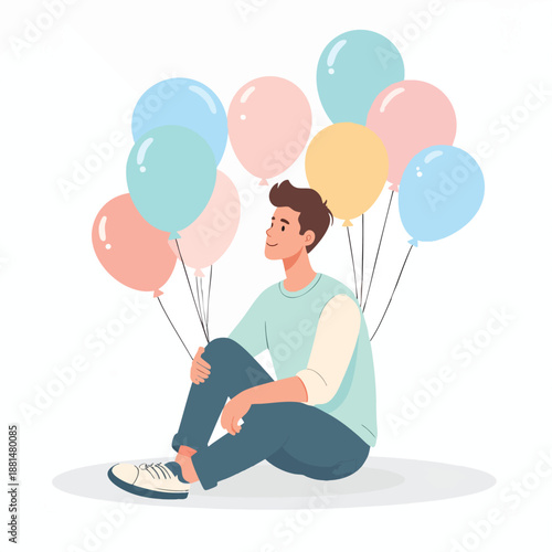 A young man sitting on the floor surrounded by colorful balloons in a joyful scene
