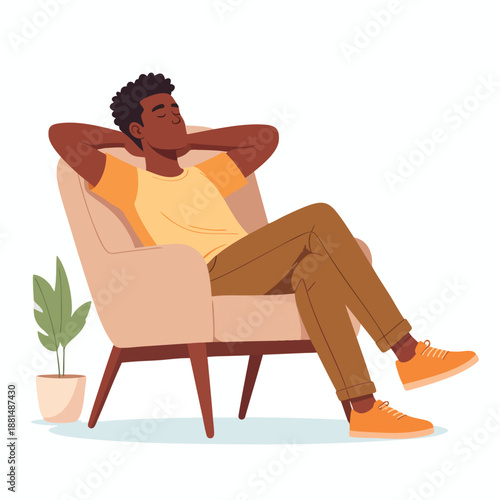 Relaxed man lounging on a comfortable armchair indoors with a plant nearby