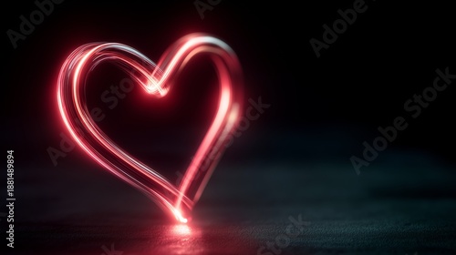Glowing Red Neon Heart Light Painting on Dark Textured Surface, Abstract Romantic Love Symbol for Valentine Day Background