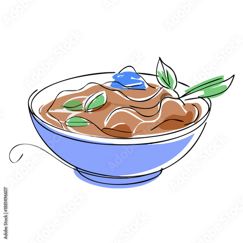 Bowl of delicious soup with herbs and a blue garnish   