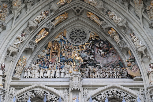 Gothic stonemasonry art above the entrance to the Bern Minster, Switzerland