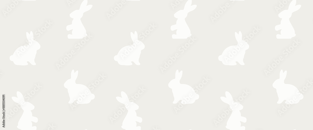 Fototapeta premium White sitting and standing rabbits on beige background. Cloud dancer - 2026 pantone colour of the year. Easter seamless pattern. 