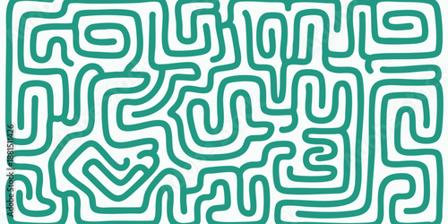 Aerial view of a complex green maze with intricate paths and a central dead end