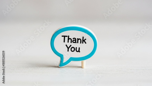 Speech bubble with Thank You text a simple and clean design element for expressing gratitude isolated on a light background