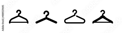 Set of four coat hangers on white background for clothing storage