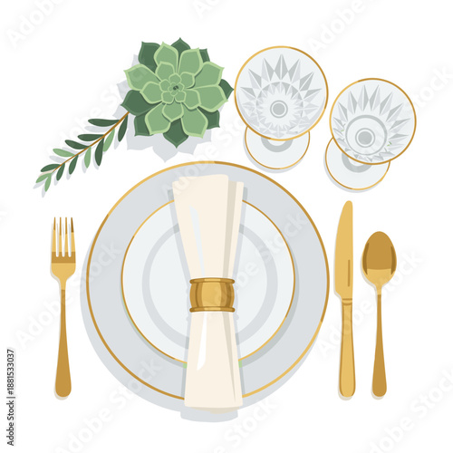 Elegant wedding table setting with gold flatware and greenery.