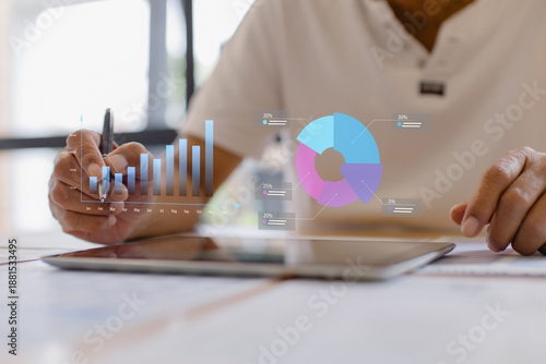 Senior person analyzing business data on tablet with digital charts and graphs. Concept of data analytics, financial report, business performance, strategy planning and modern technology dashboard.