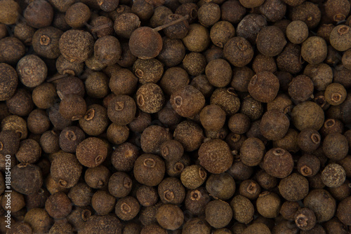 Photos Close up of allspice seeds background