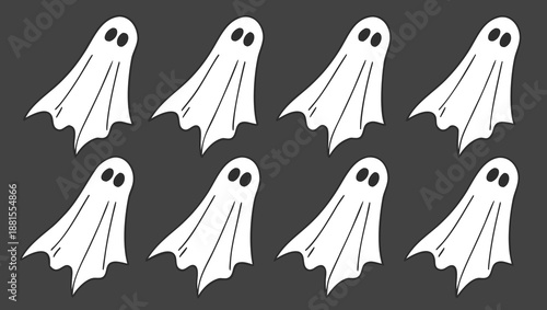 A playful arrangement of five white ghost figures against a dark background creating a spooky silhouette