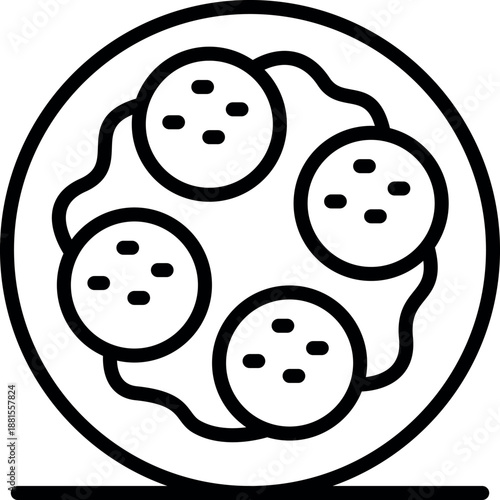 Delicious falafel pita bread with creamy tahini sauce and sesame seeds, served on a plate