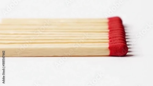 Arrangement of matches on a white background showing fire safety concept beautifully