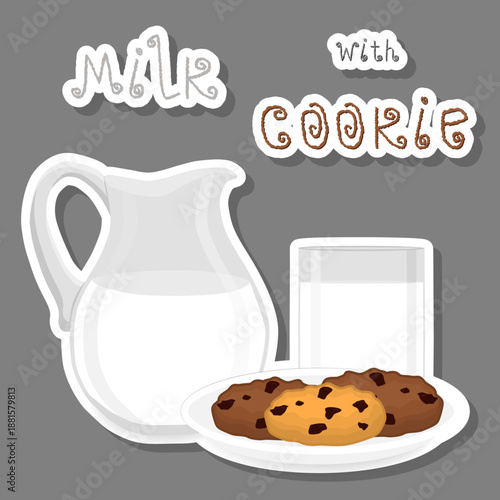 Transparent jug with white milk and tasty homemade cookies