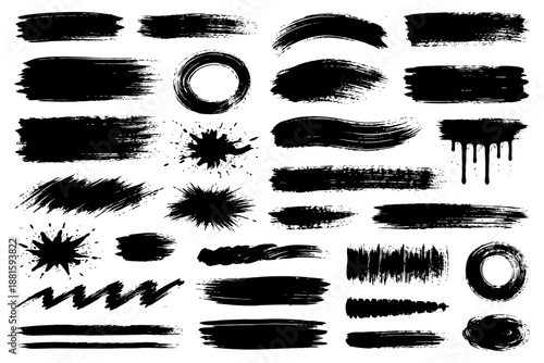 Abstract black brush strokes and ink splatter set on white background.