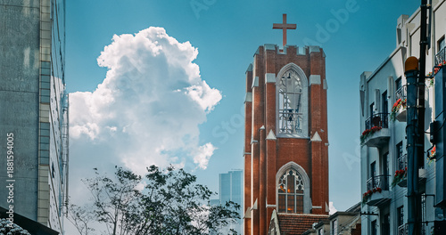 Towering Church with Cross Set Against Clear Sky in Urban Location Shanghai, China