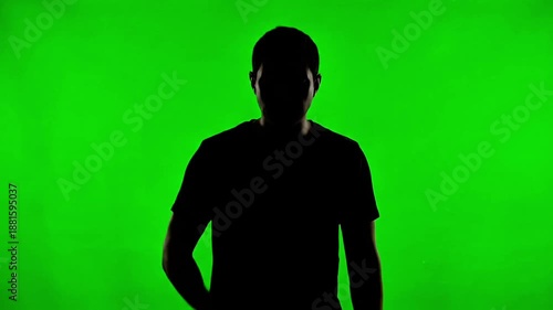Silhouette person coughing facing forward on green screen background
