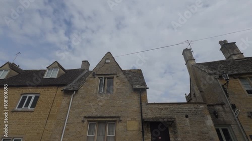 Wallpaper Mural Walking along typical stone houses in the charming Cotswold village Torontodigital.ca