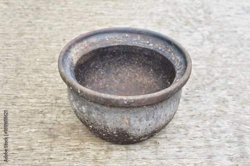 Wallpaper Mural Old Rustic Clay Bowl on Wooden Background Close-Up Torontodigital.ca