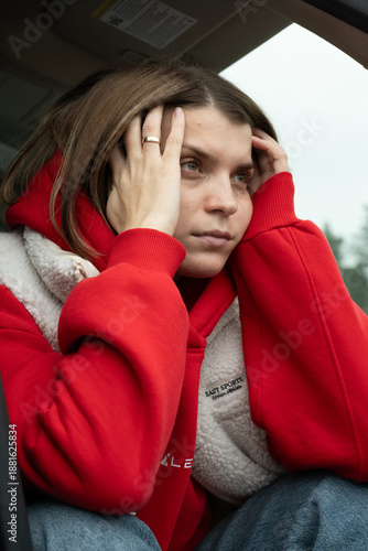 Candid shot capturing frustration inside congested parked vehicle