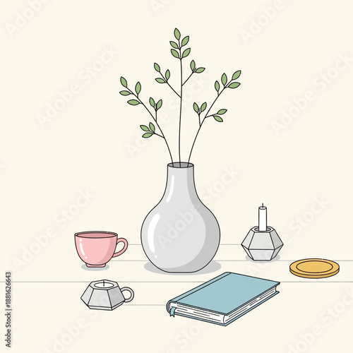 Cozy Home Scene: Vase with Leaves, Book, Candle, and Tea Cup on Table