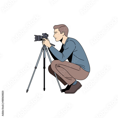 Man Photographer Crouching with DSLR Camera on Tripod, Capturing Shot