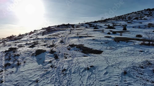 Wallpaper Mural Travelling arrière drone d'une randonneuse et son chien dans la montagne enneigée de Cerdagne Torontodigital.ca