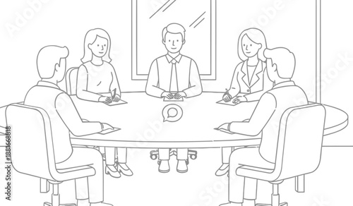 Business team meeting around a table with a laptop in a modern office setting