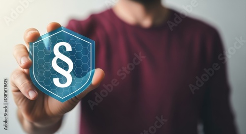 Man holding virtual paragraph symbol icon, law and justice concept, legal regulations, cybersecurity protection