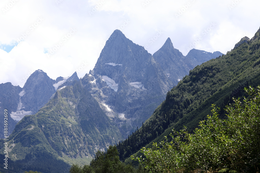 Naklejka premium Scenic panorama of mountains covered with snow