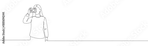 One continuous line drawing of photographer holding camera and taking a photo. Minimalist style