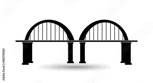 Silhouette of a double arch bridge structure over a body of water.