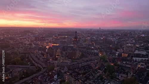 Wallpaper Mural Stevens Church rising above Nijmegen during a colorful sunrise. Torontodigital.ca