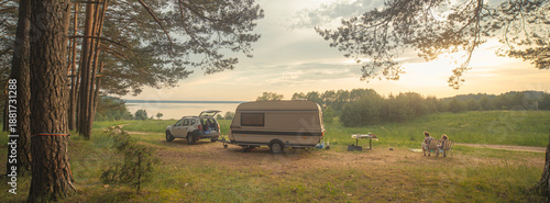 Camping on the shore of a lake in the forest