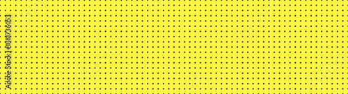 Peg board perforated seamless pattern with circle holes yellow color background. Wall structure backdrop for working bench tools, decoration, website, banner