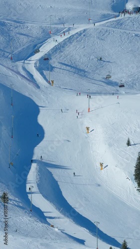 Wallpaper Mural Aerial detail of ski resort slopes showing groomed terrain and lift infrastructure, suitable for winter sports and alpine resort visuals Torontodigital.ca