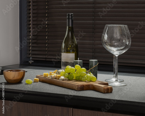 Wine Display Setup, Creating Warm And Personal Scene With Wine Glasses And Lush Grape Displays