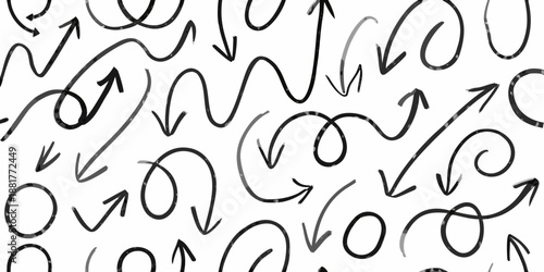 A chaotic pattern of hand drawn arrows and swirls on a white background