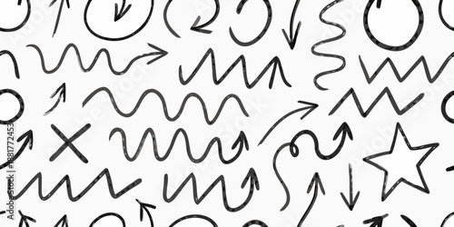 Abstract black and white doodle pattern with arrows waves and random shapes