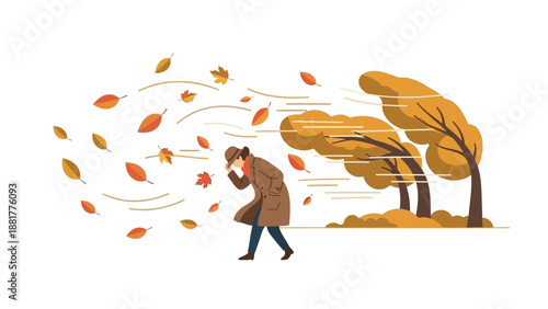 Woman walks through autumn leaves blowing in the wind on a crisp fall day outdoors